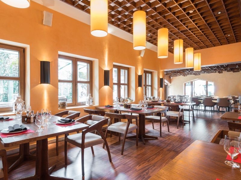 Restaurant dining room where guests pay at the table